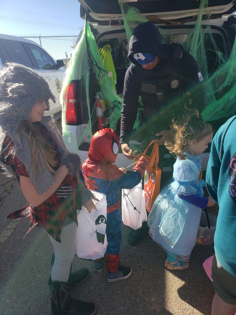 Trick or treaters during Trunk or Treat